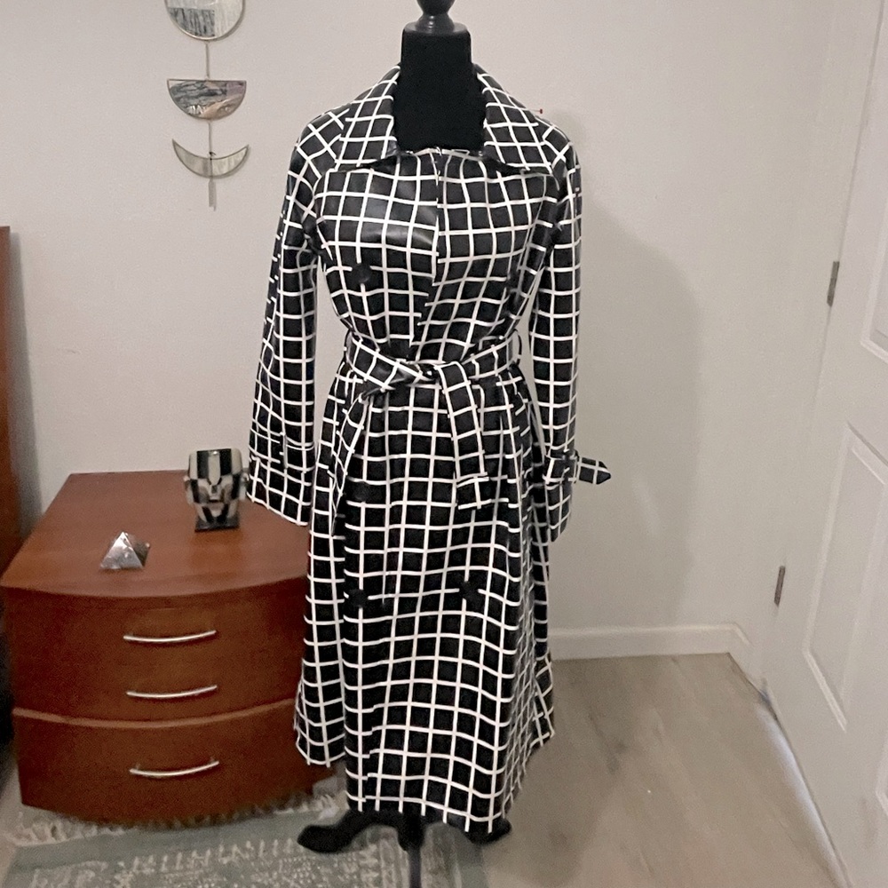 Beautiful vinyl coat brand new
Never used